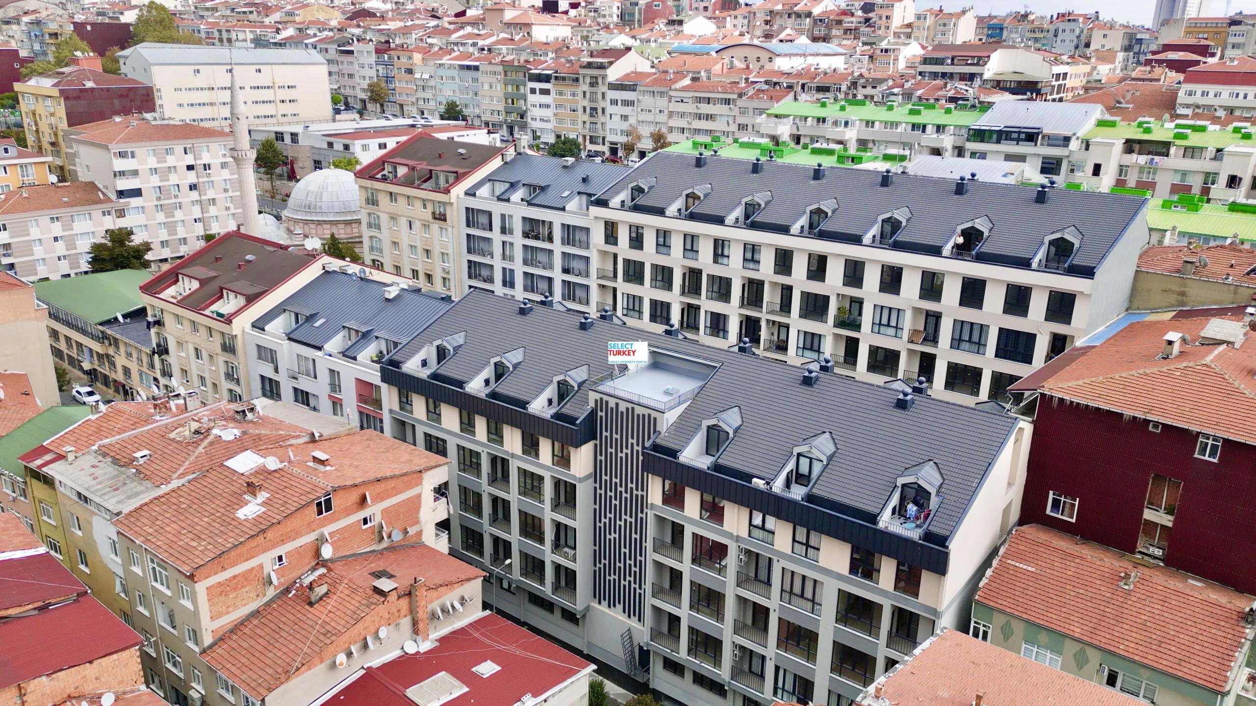 Vibrant Taksim Square, a short walk from Taksim Palas, showcasing Istanbul's cultural and social hub.