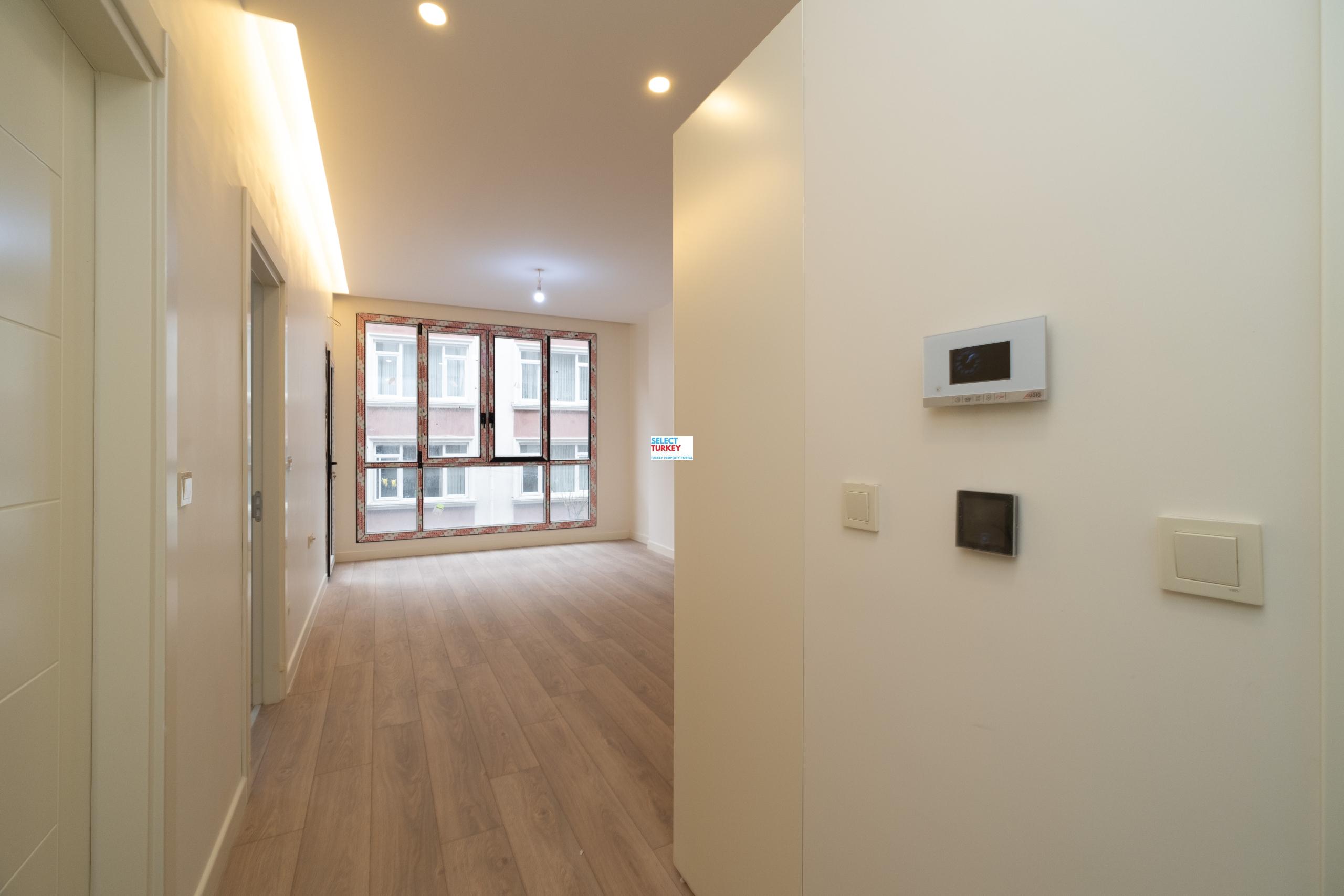 Luxurious bedroom in Taksim Palas with cozy bedding, modern decor, and ample natural light