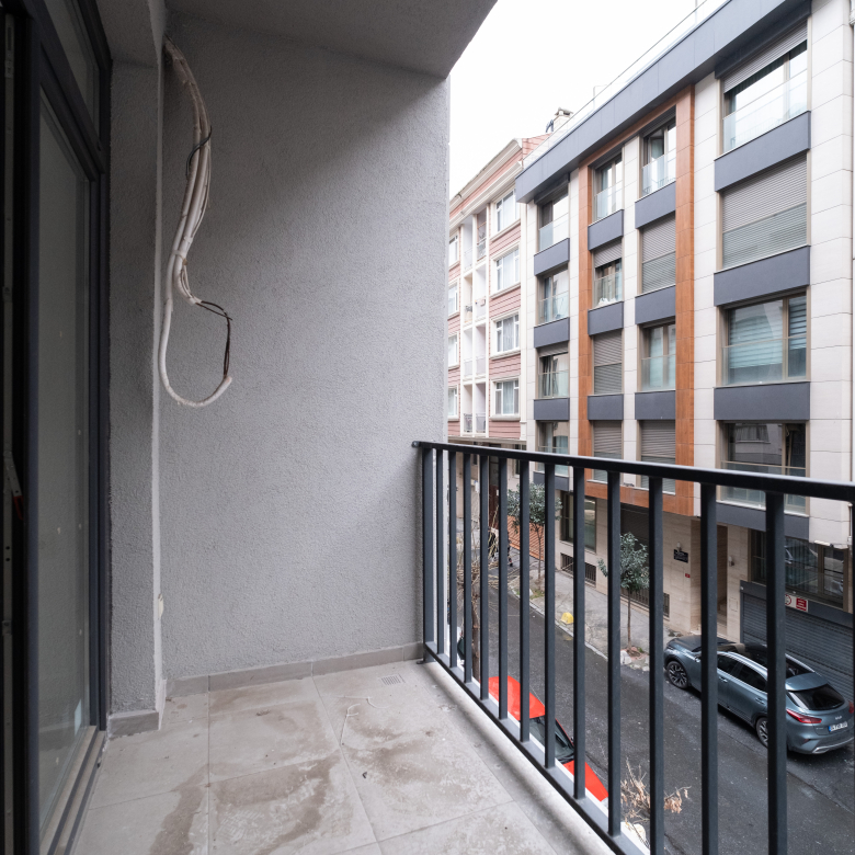 Private balcony in Taksim Palas offering stunning views of Istanbul's cityscape.