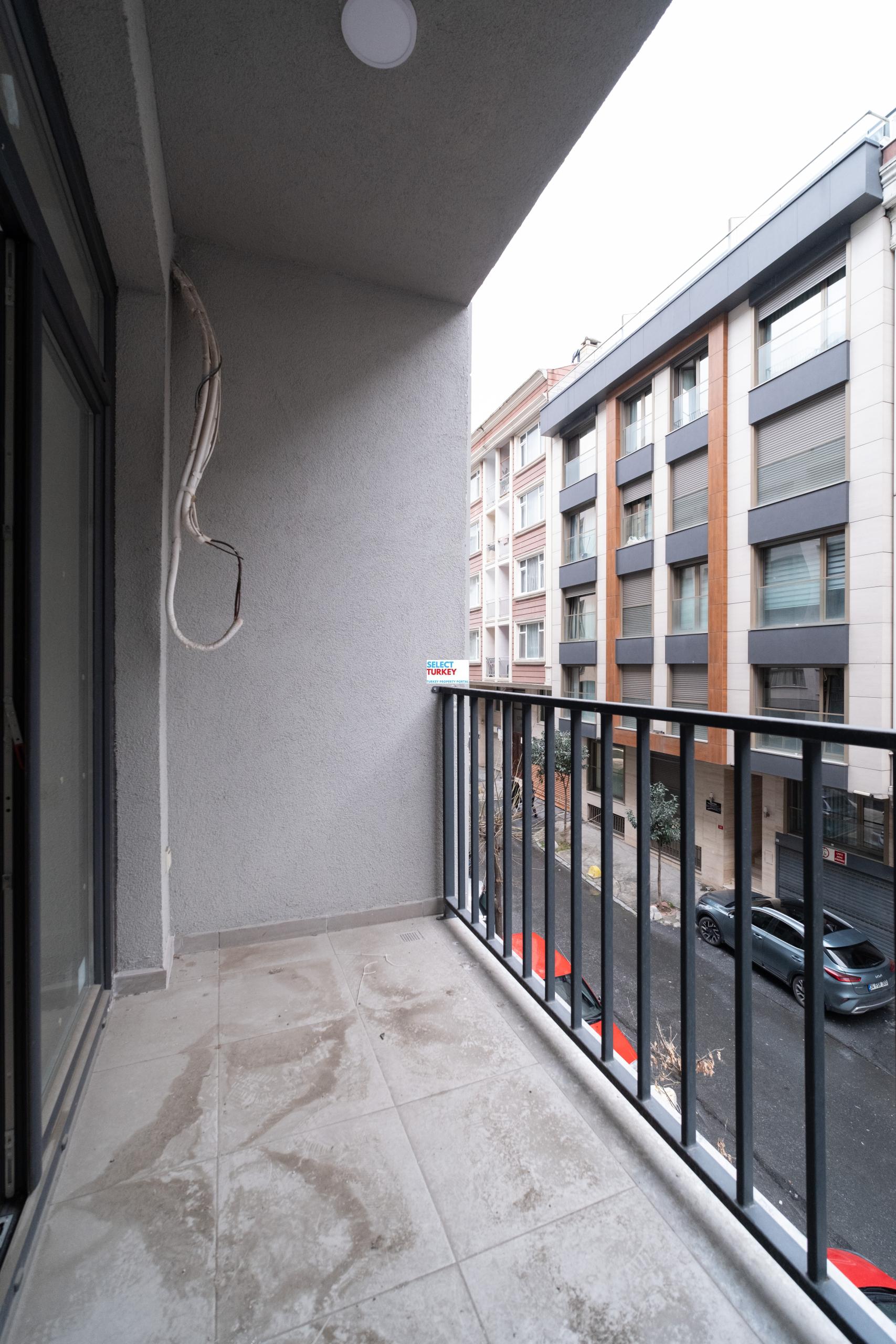 Private balcony in Taksim Palas offering stunning views of Istanbul's cityscape.